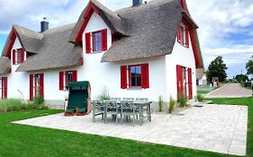 Haus zwischen Mühle und Meer